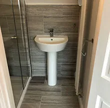 sink in a grey bathroom